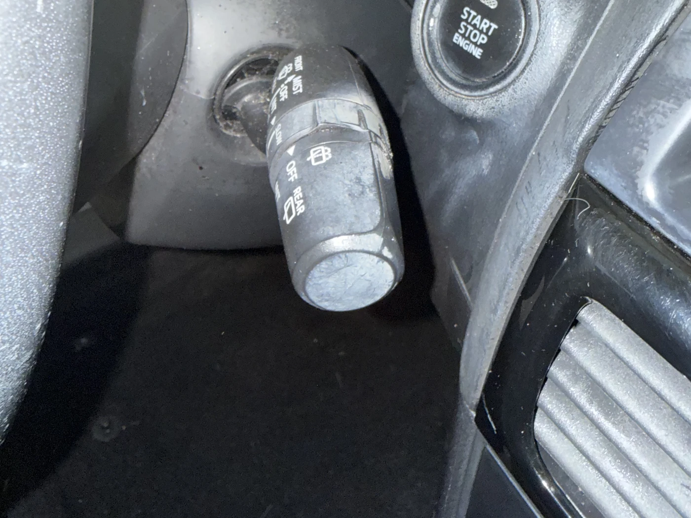 Dusty console and wiper stalk with grime built up in the plastics