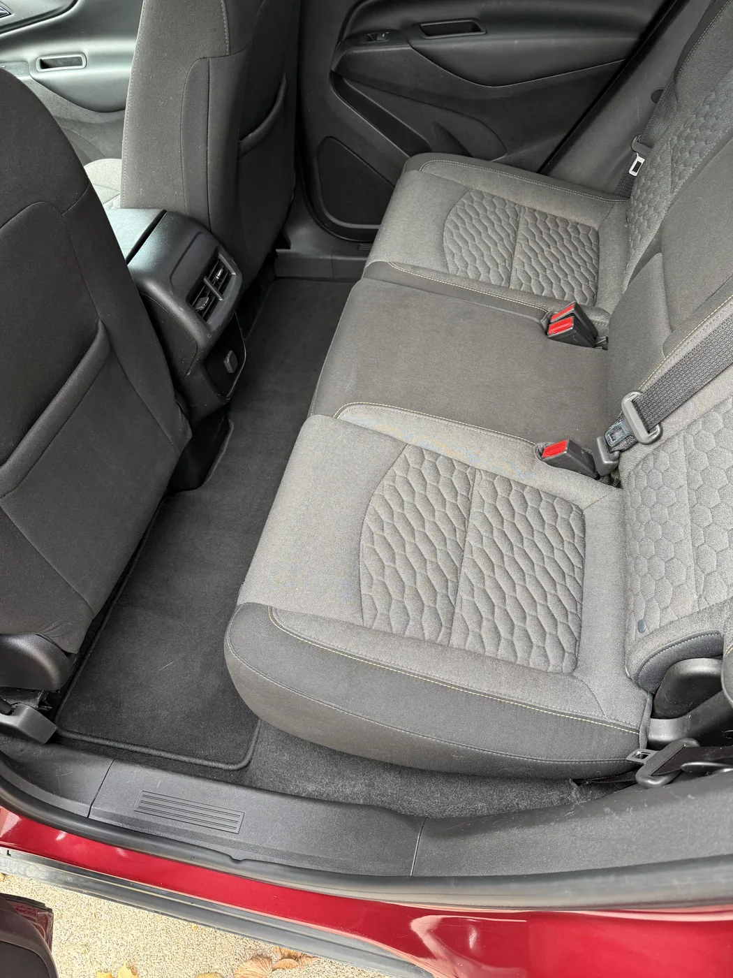 The same rear seat cleaned, upholstery and carpet finished