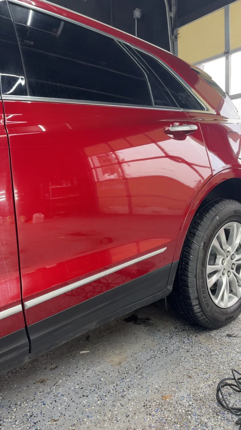 Red SUV driver's side, clean gloss finish